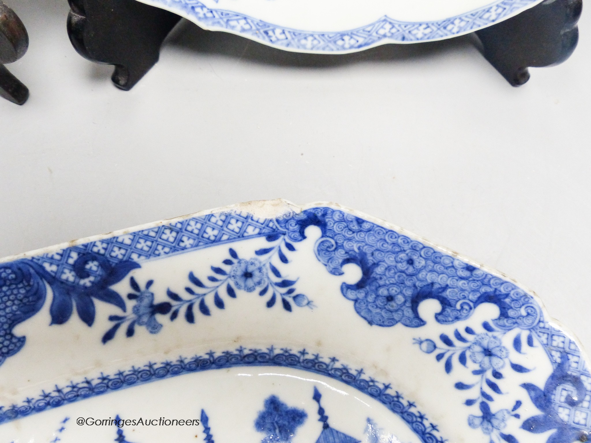 Two 18th century Chinese circular export plates and two canted rectangular dishes, 32 x 23cm
